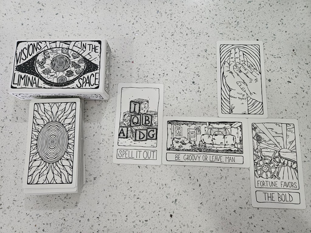 Oracle deck by Bakara Wintner. Black and white line art with straightforward and interesting messages.